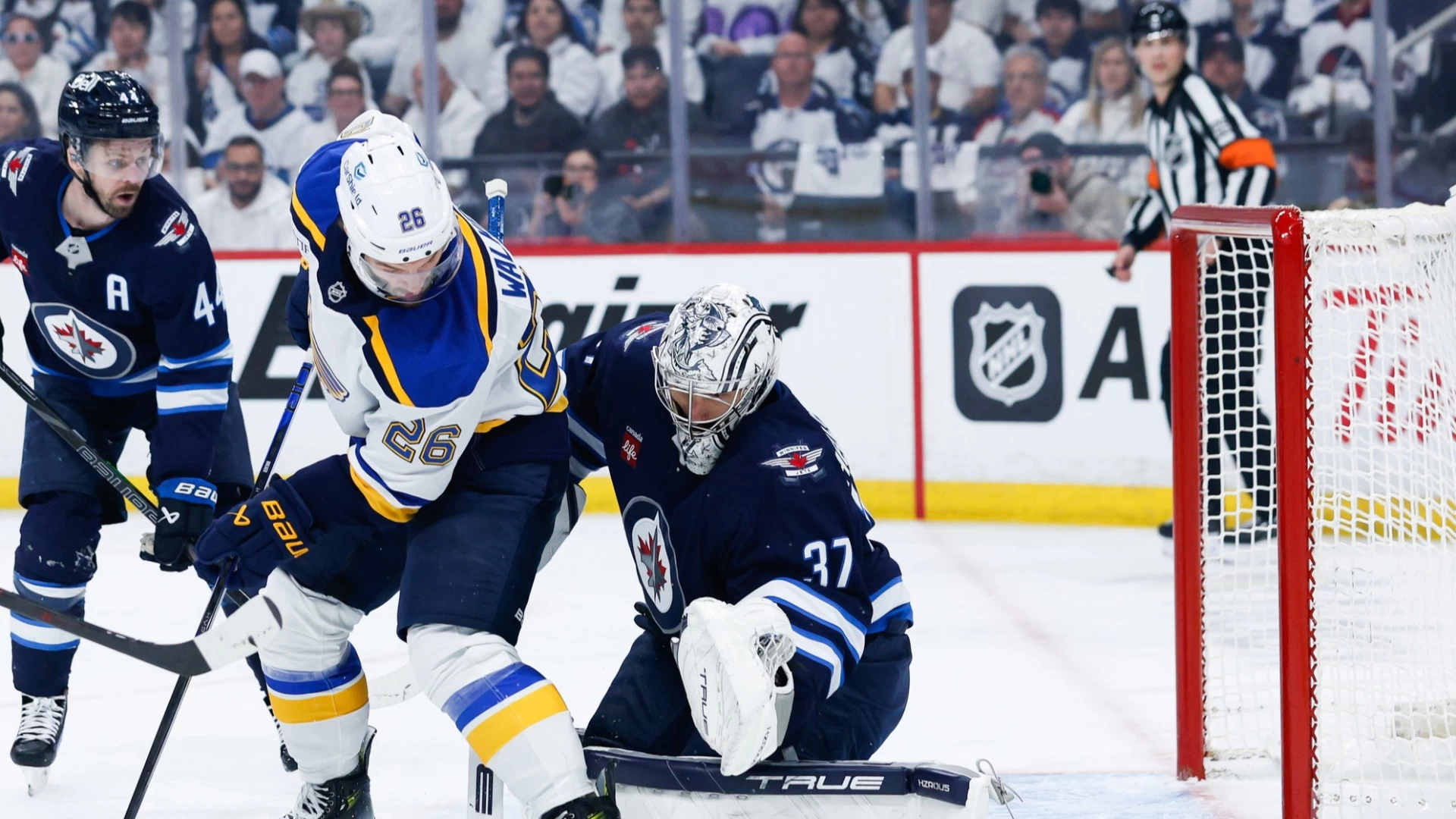 Connor Hellebuyck of the Winnipeg Jets Struggles in NHL Road Playoffs
