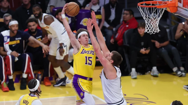 How LeBron's flight, Reaves' genius and a section of madmen helped the Lakers dive past Nuggets in overtime