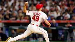 Angels drop pitchers' duel in extra innings in home opener