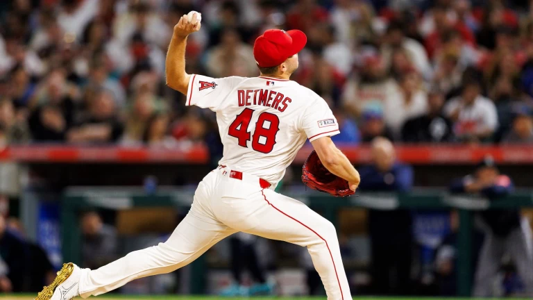 Angels drop pitchers' duel in extra innings in home opener