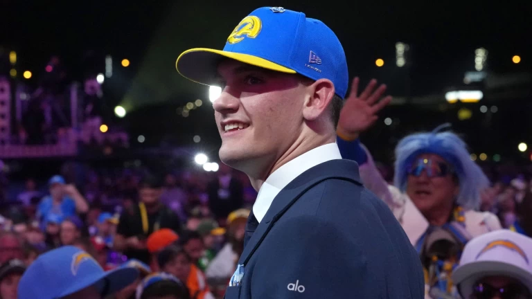 John Lynch’s telling smile says it all on Rams’ shocking Ty Simpson pick at 13
