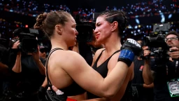 Rousey defeats Carano by armbar submission in 17 seconds