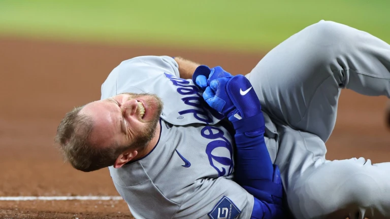 Muncy injury concern looms as Dodgers fall on Marte walk-off