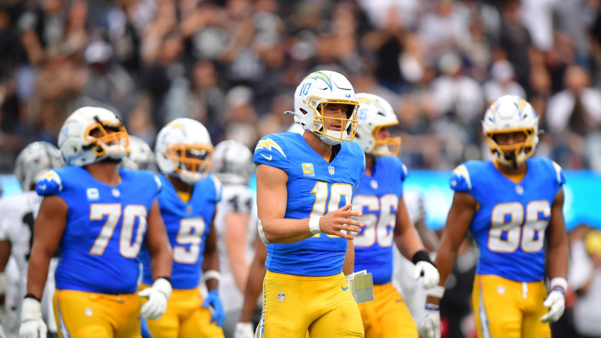 Harbaugh, McDaniel searching for answers as Chargers fall to 0-2