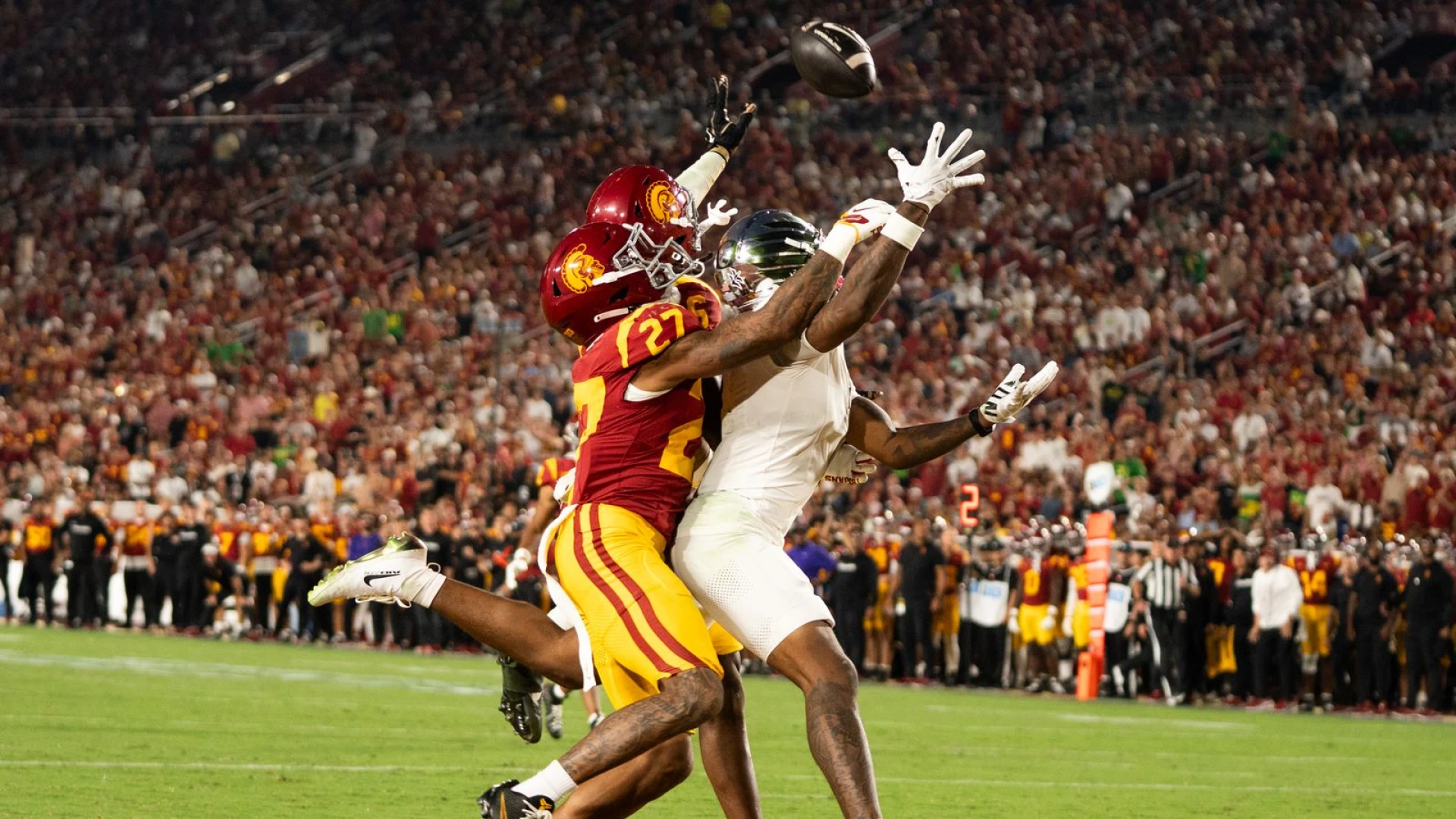Oregon survives scary Moore injury, rolls past USC yet again