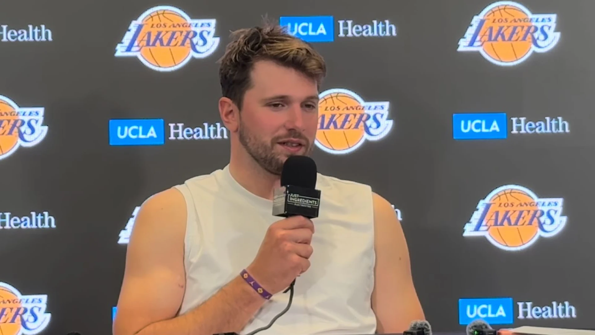 Lakers introduce new sponsorship opportunity with Just Ingredients logo on press conference microphones