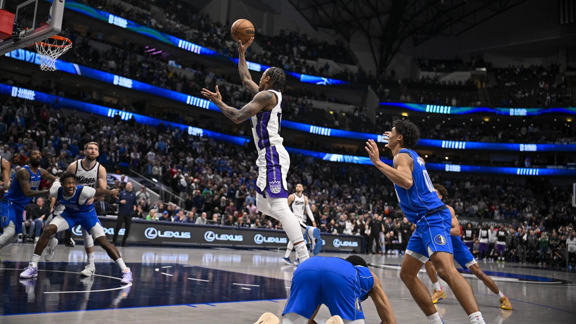 Kings Triumph Over Mavs in Thrilling 129-128 Overtime Victory