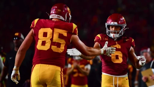 Michigan vs. USC Showdown: Travel Woes & Odds Insight