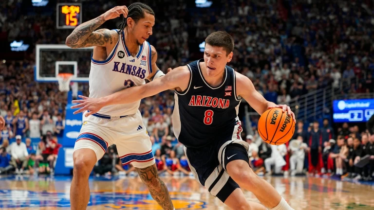 Arizona Suffers First Loss as Kansas Triumphs in Fierce Game