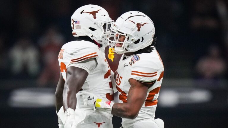 #6 - Texas Longhorns (At-Large) vs. #11 - Michigan Wolverines (At-Large)