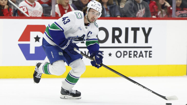 Quinn Hughes (D)