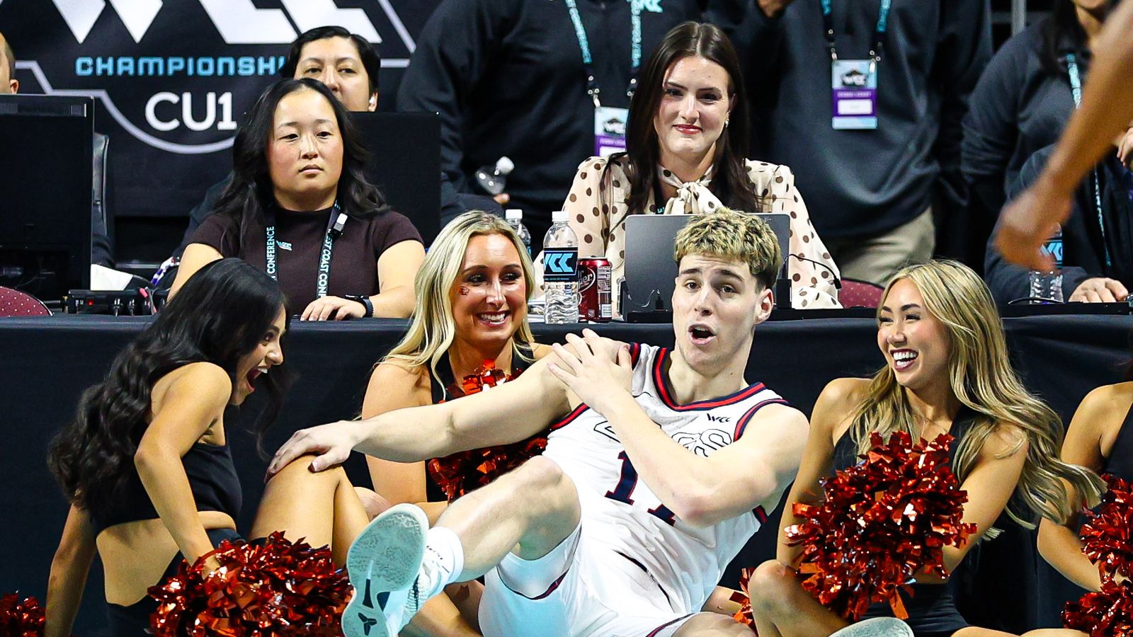 Gonzaga Bulldogs G Mario Saint-Supéry (17) falls into the Oregon State Beavers cheerleaders after making a basket during the 2026 WCC Tournament Semi-Finals against the Oregon State Beavers on Monday March 9, 2026, in Las Vegas, Nevada.