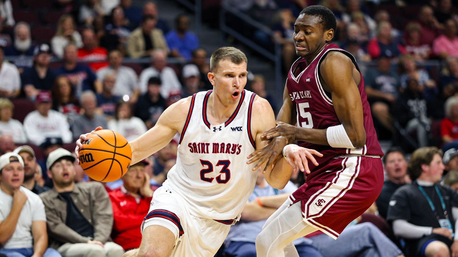 Saint Mary's Gaels F Paulius Murauskas (23) drives with the ball guarded by Santa Clara Broncos G Thierry Darlan (15) during the 2026 WCC Tournament Semi-Finals on Monday March 9, 2026, in Las Vegas, Nevada.