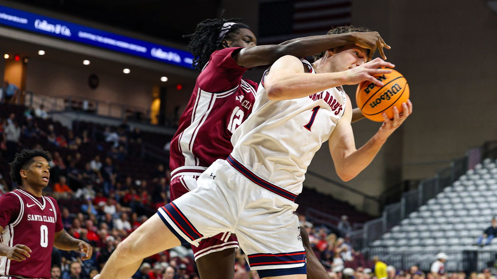 Saint Mary's Gaels C Harry Wessels (1) is fouled by Santa Clara Broncos C Bukky Oboye (12) during the 2026 WCC Tournament Semi-Finals on Monday March 9, 2026, in Las Vegas, Nevada.