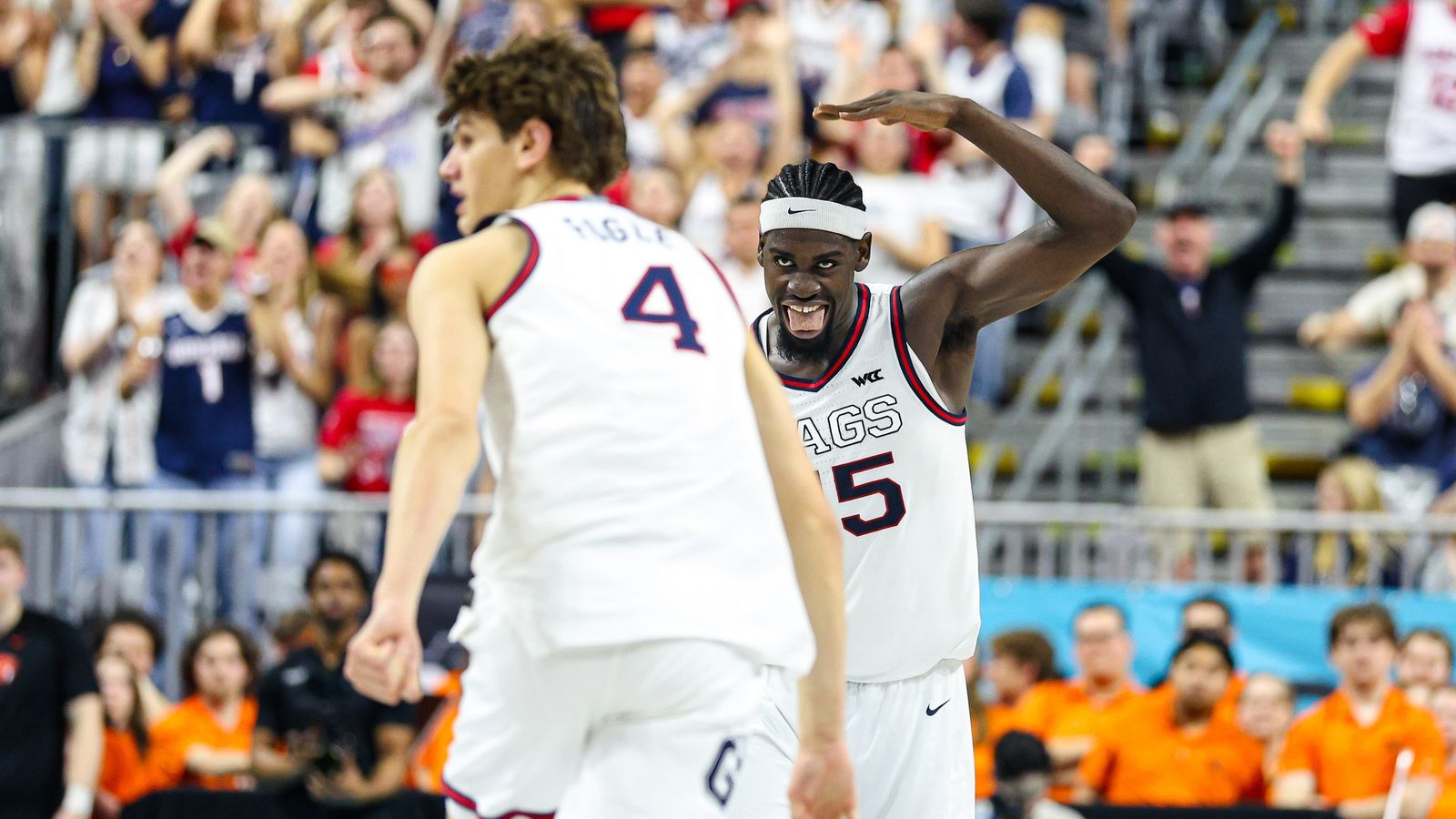 Gonzaga Bulldogs F Graham Ike (15) reacts after his teammate Freshman G Davis Fogle (4) dunked the ball against the Oregon State Beavers at the 2026 WCC Tournament Semi-Finals on Monday March 9, 2026, in Las Vegas, Nevada.