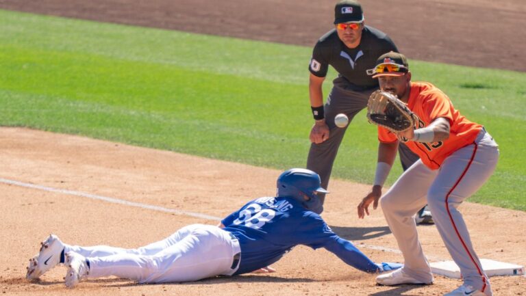Beating the Throw: Dalton Rushing Slides in Safe at First