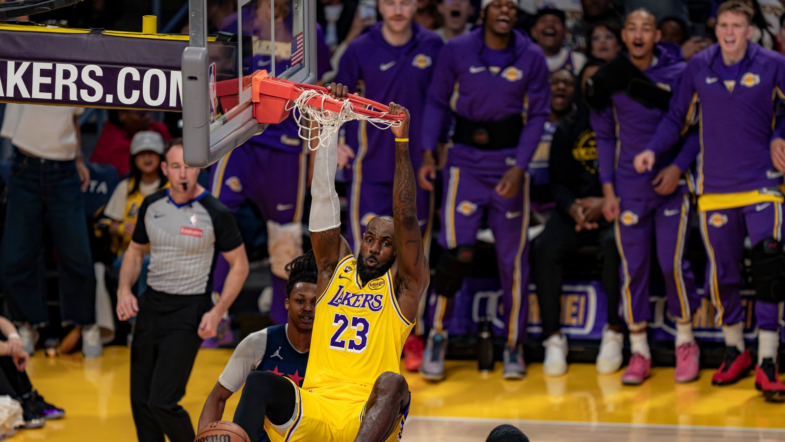 LeBron James Hangs on the Rim After a Monster Flush