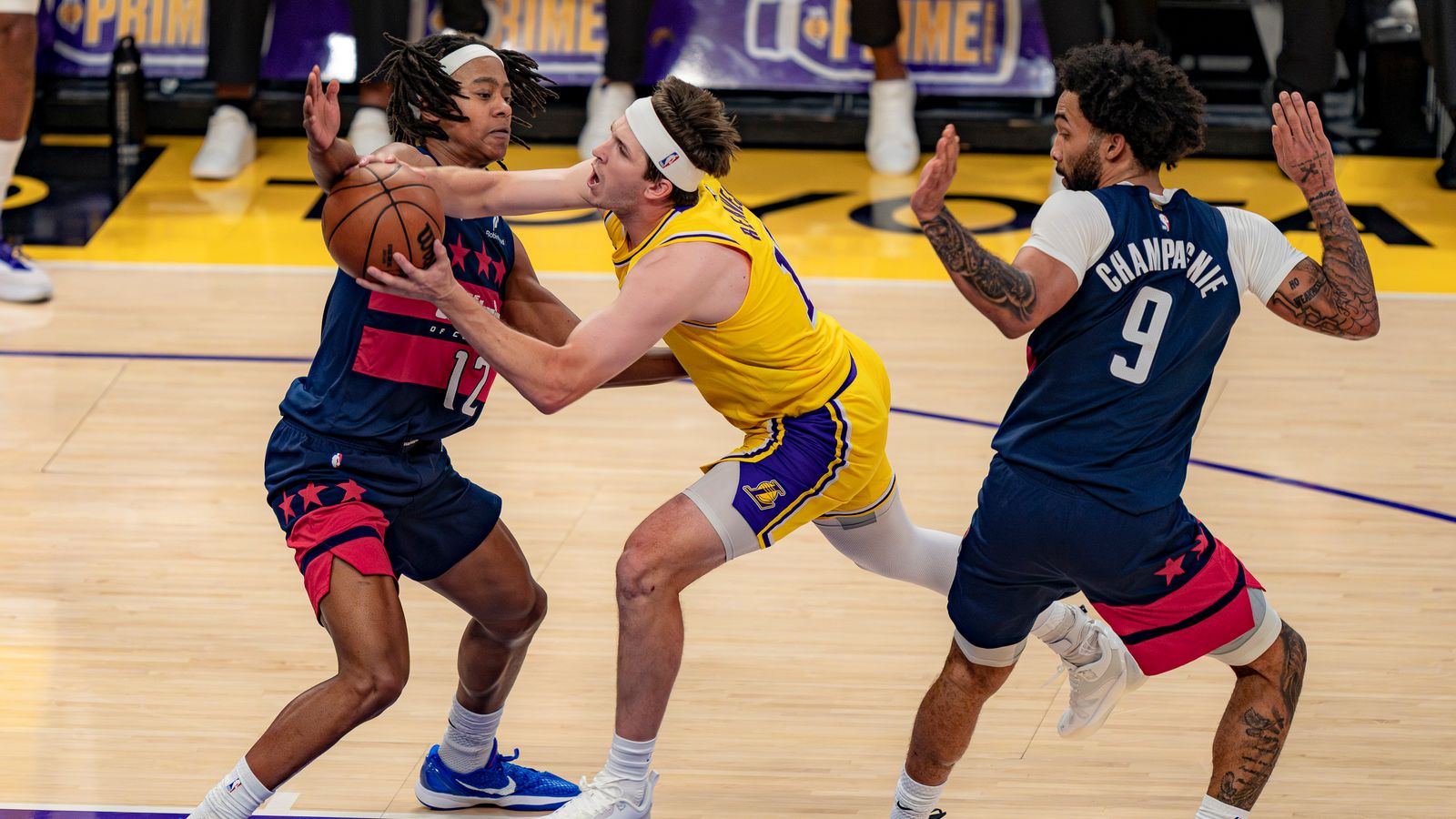 Austin Reaves Draws Contact on a Strong Drive