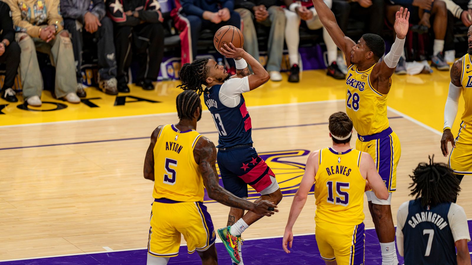 Sharife Cooper Fires a Jump Shot Over the Lakers Defense