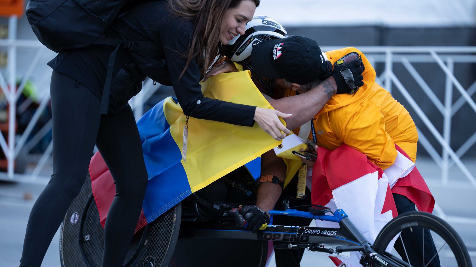 Francisco Sanclemente of Colombia is greeted by supporters after finishing the Los Angeles Marathon on Sunday, March 8, 2026, in Los Angeles.