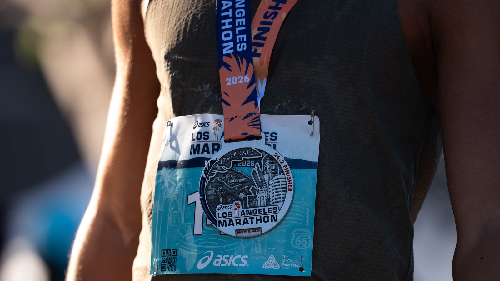 A finisher's medal and race bib from the 2026 Los Angeles Marathon are displayed Sunday, March 8, 2026, in Los Angeles.