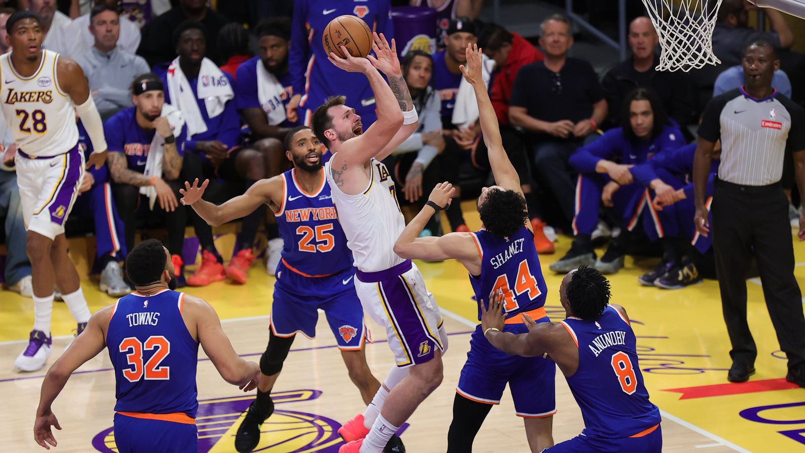 Los Angeles Lakers guard Luka Doncic (77) shoots the basketball during an NBA game against the New York Knicks on March 8, 2026 in Los Angeles, CA.