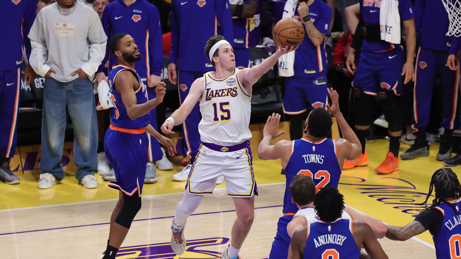 Los Angeles Lakers guard Austin Reaves (15) drives in for a lay up during an NBA game against the New York Knicks on March 8, 2026 in Los Angeles, CA.