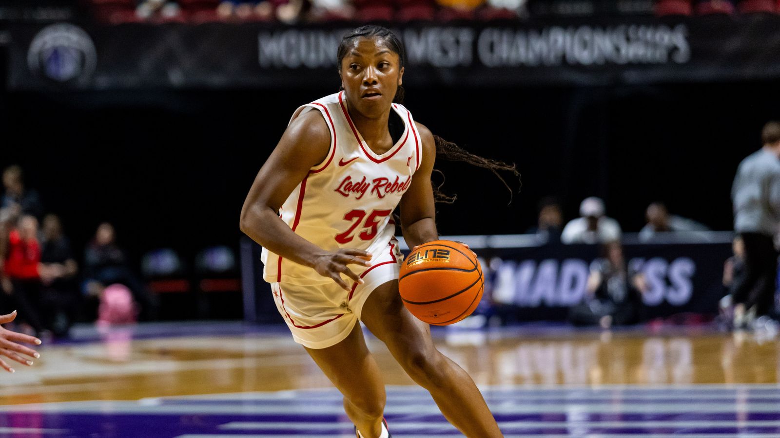 UNLV Lady Rebels guard Aaliyah Alexander (25) dribbles the ball towards the basket during a Mountain West Tournament semifinal game between UNLV Lady Rebels and the Colorado State Rams, Monday March 9, 2026 in Las Vegas, Nev.