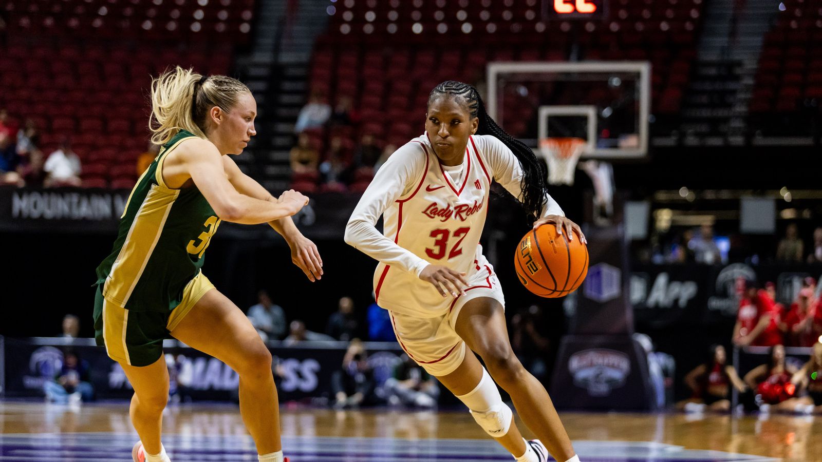 UNLV Lady Rebels forward Meadow Rowland (32) drives to the basket during a Mountain West Tournament semifinal game between UNLV Lady Rebels and the Colorado State Rams, Monday March 9, 2026 in Las Vegas, Nev.