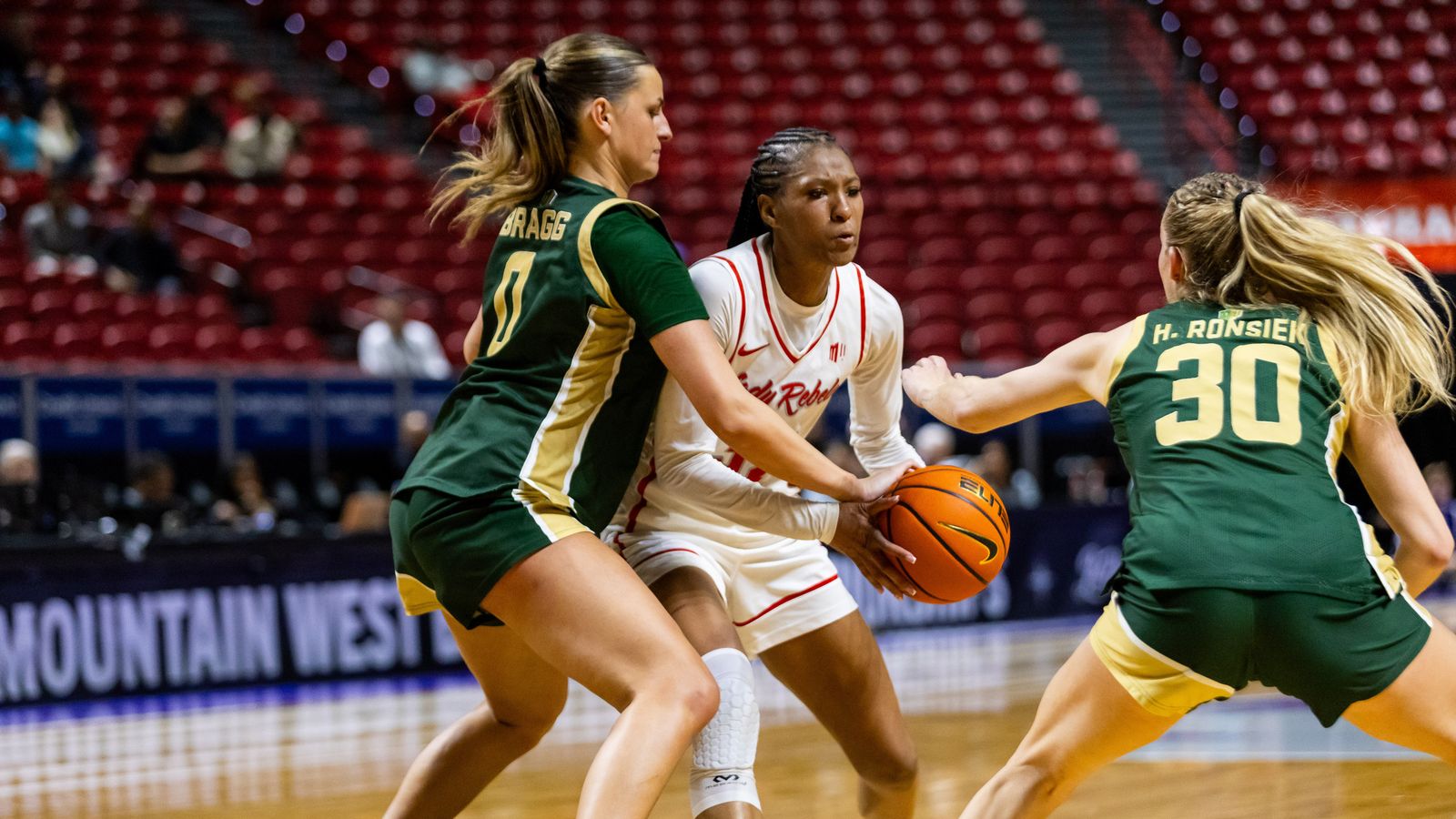 UNLV Lady Rebels forward Meadow Rowland (32) drives to the basket during a Mountain West Tournament semifinal game between UNLV Lady Rebels and the Colorado State Rams, Monday March 9, 2026 in Las Vegas, Nev.