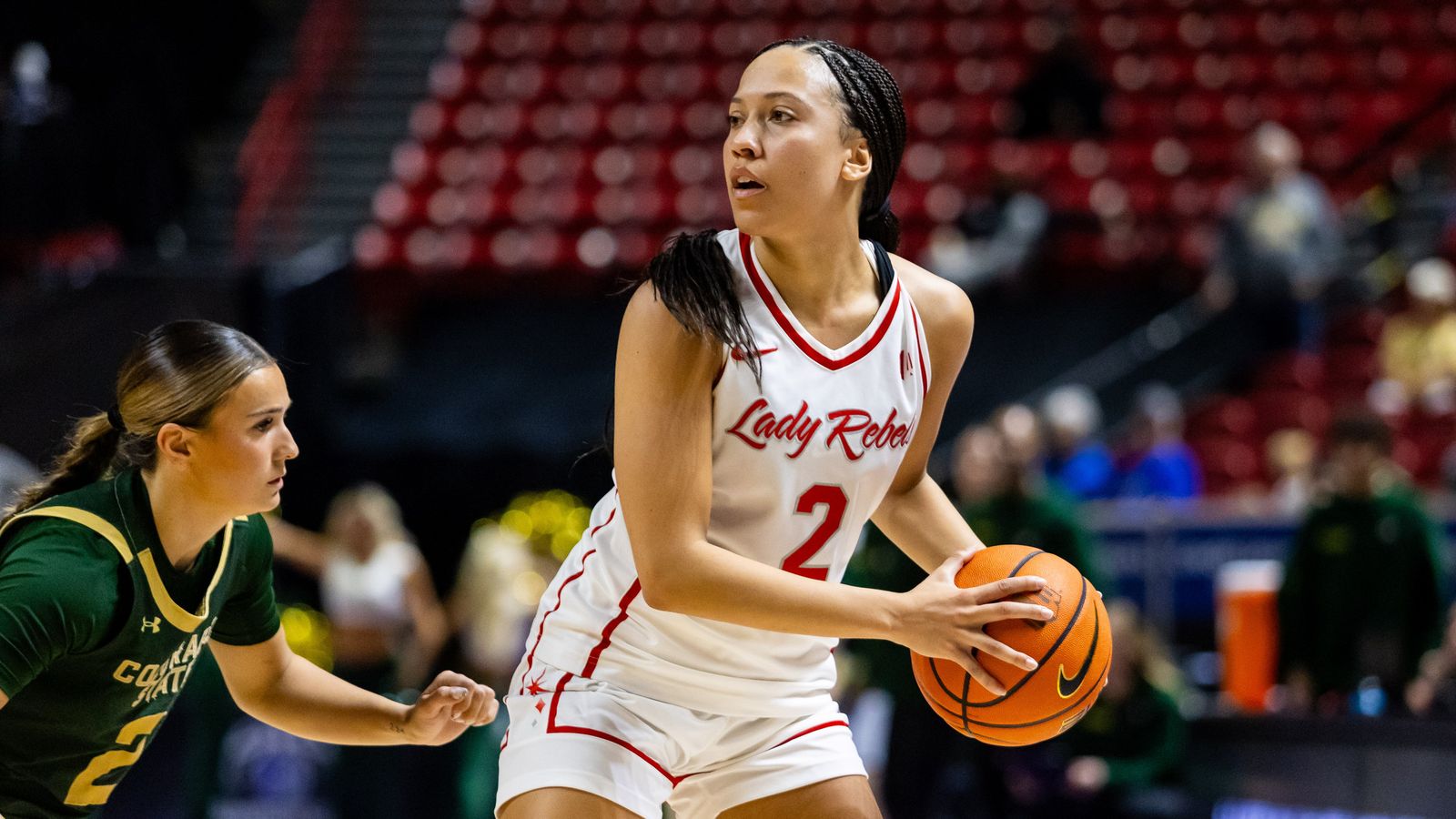 UNLV Lady Rebels guard Mariah Elohim (2) looks to pass the ball during a Mountain West Tournament semifinal game between UNLV Lady Rebels and the Colorado State Rams, Monday March 9, 2026 in Las Vegas, Nev.
