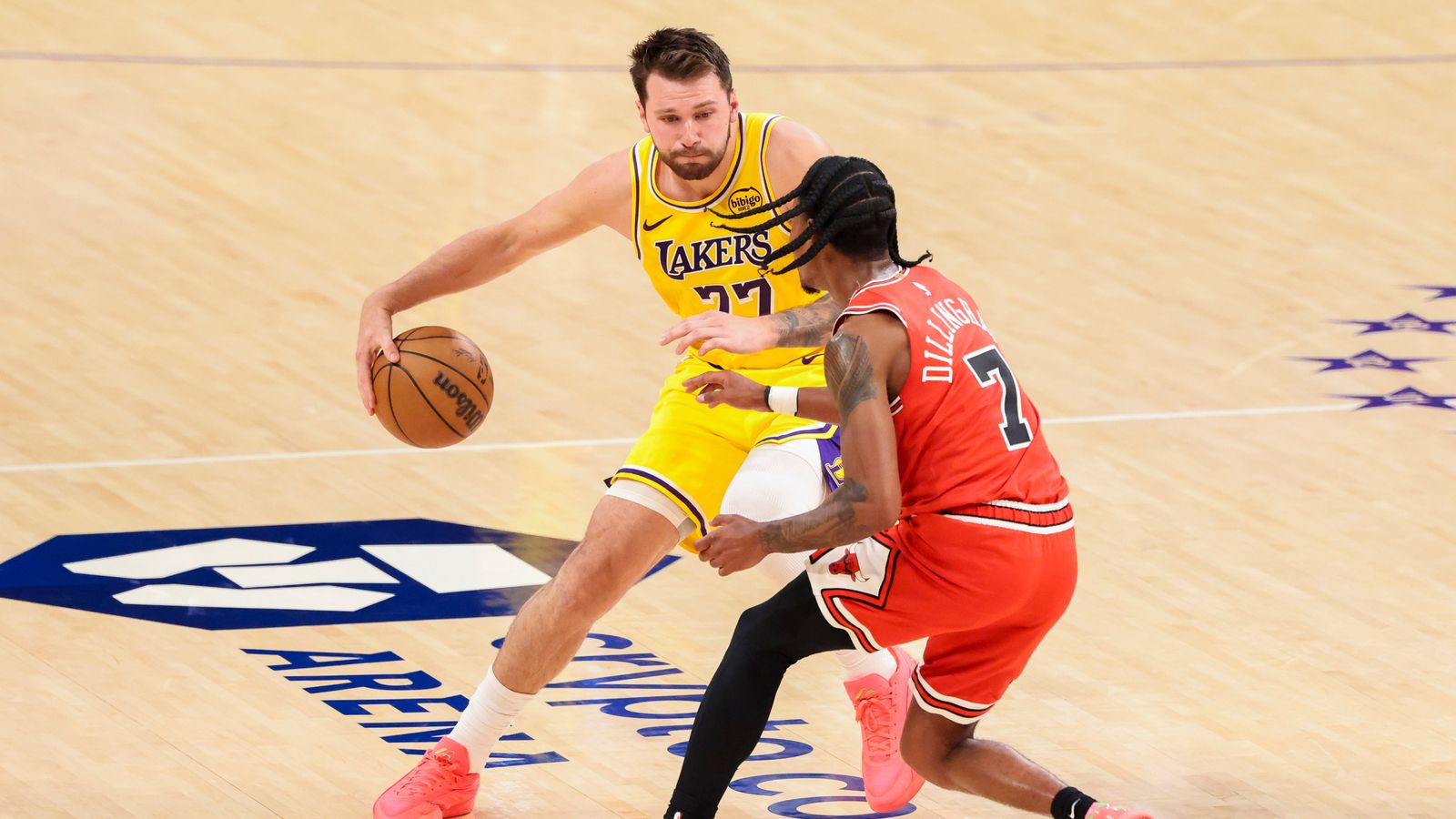 Luka Dončić #77 of the Los Angeles Lakers handles the bal against Rob Dillingham #7 of the Chicago Bulls during an NBA basketball game, Thursday March 12, 2026 in Los Angeles, Calif.
