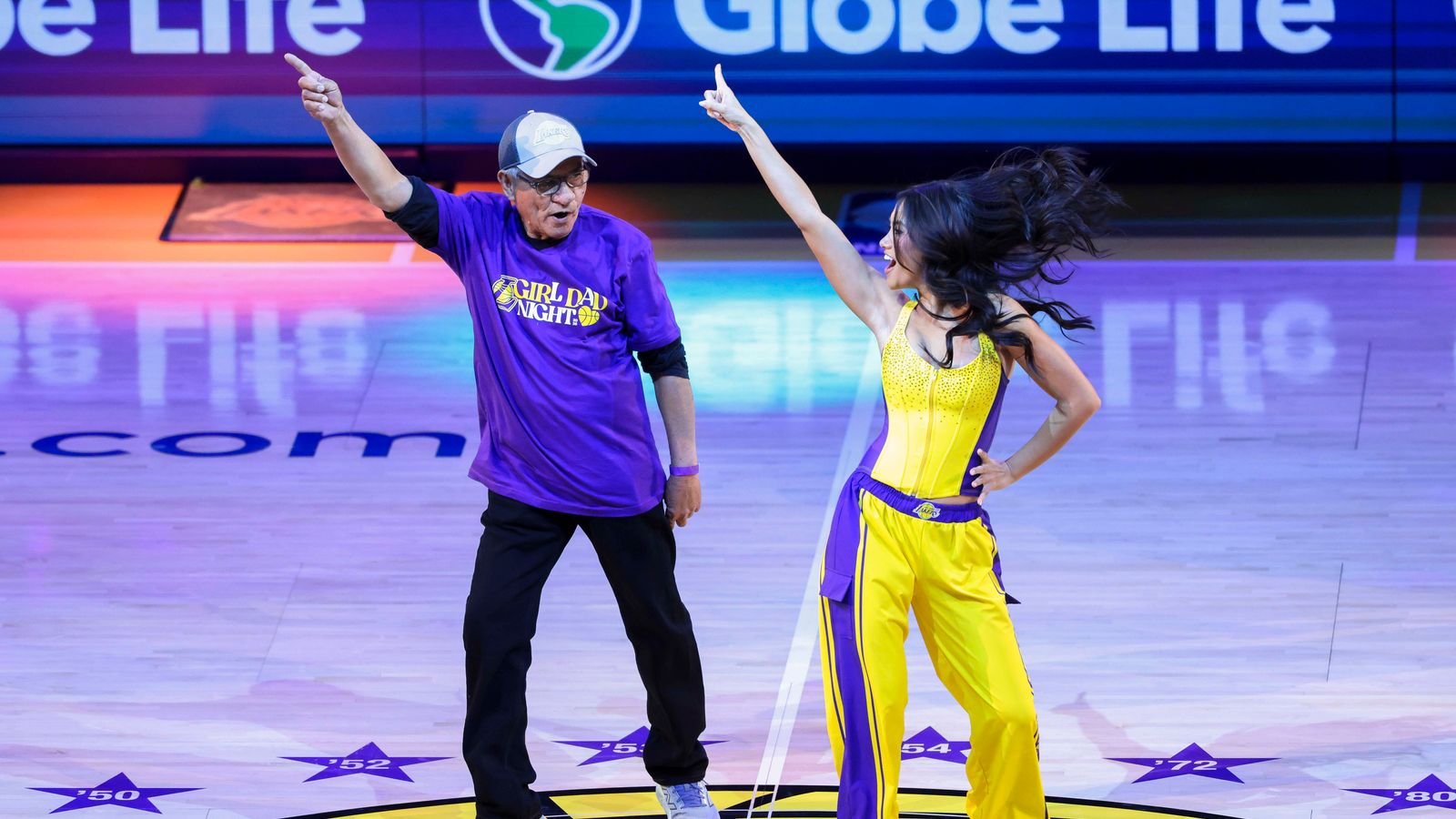 The Lakers Girls perform with their dads and special guests as part of Girl Dad Night during an NBA game between the Los Angeles Lakers and Chicago Bulls, Thursday March 12, 2026 in Los Angeles, Calif.