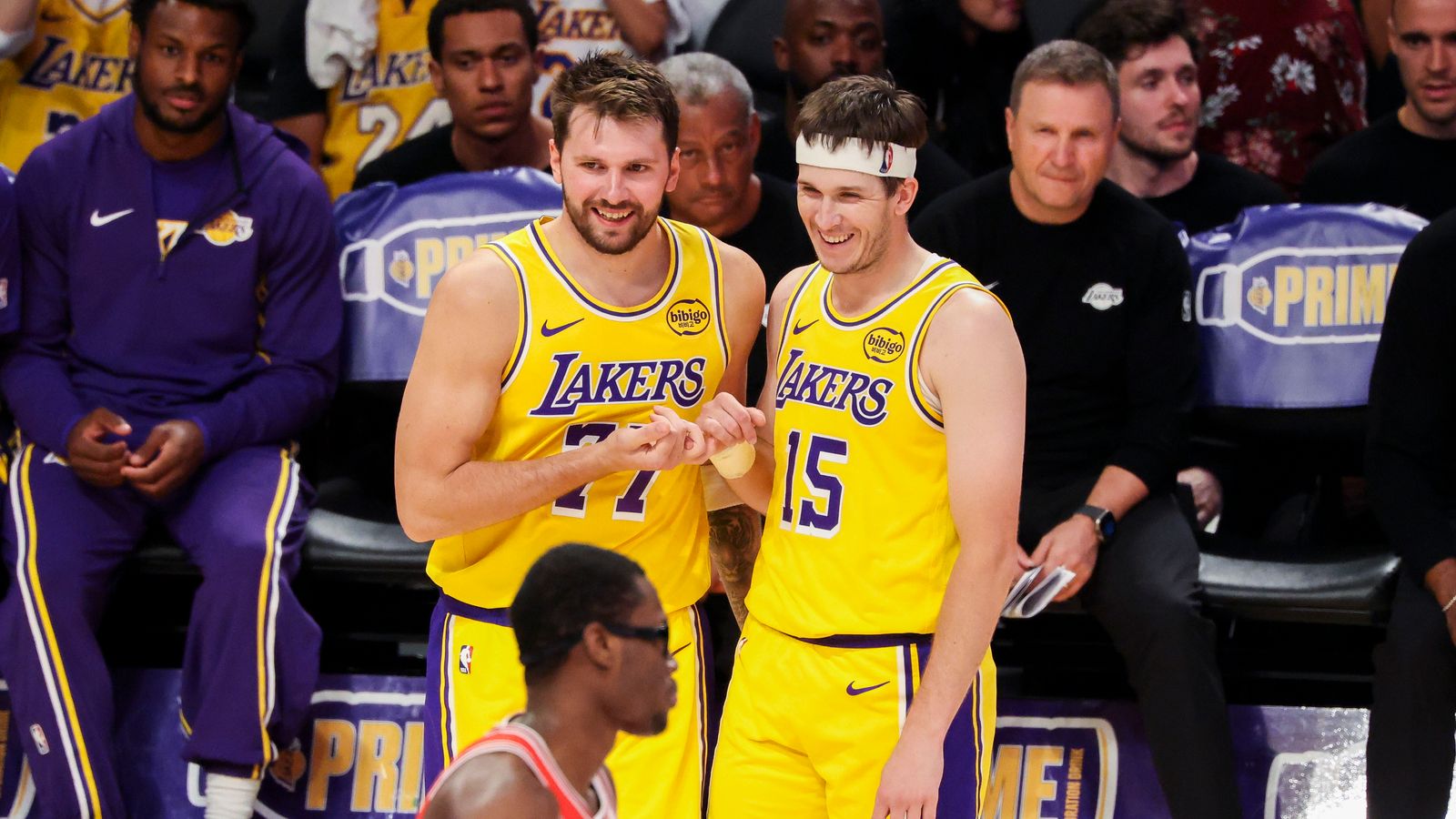 Luka Dončić #77 of the Los Angeles Lakers and Austin Reaves #15 of the Los Angeles Lakers smile together on the court during an NBA basketball game against the Chicago Bulls, Thursday March 12, 2026 in Los Angeles, Calif.