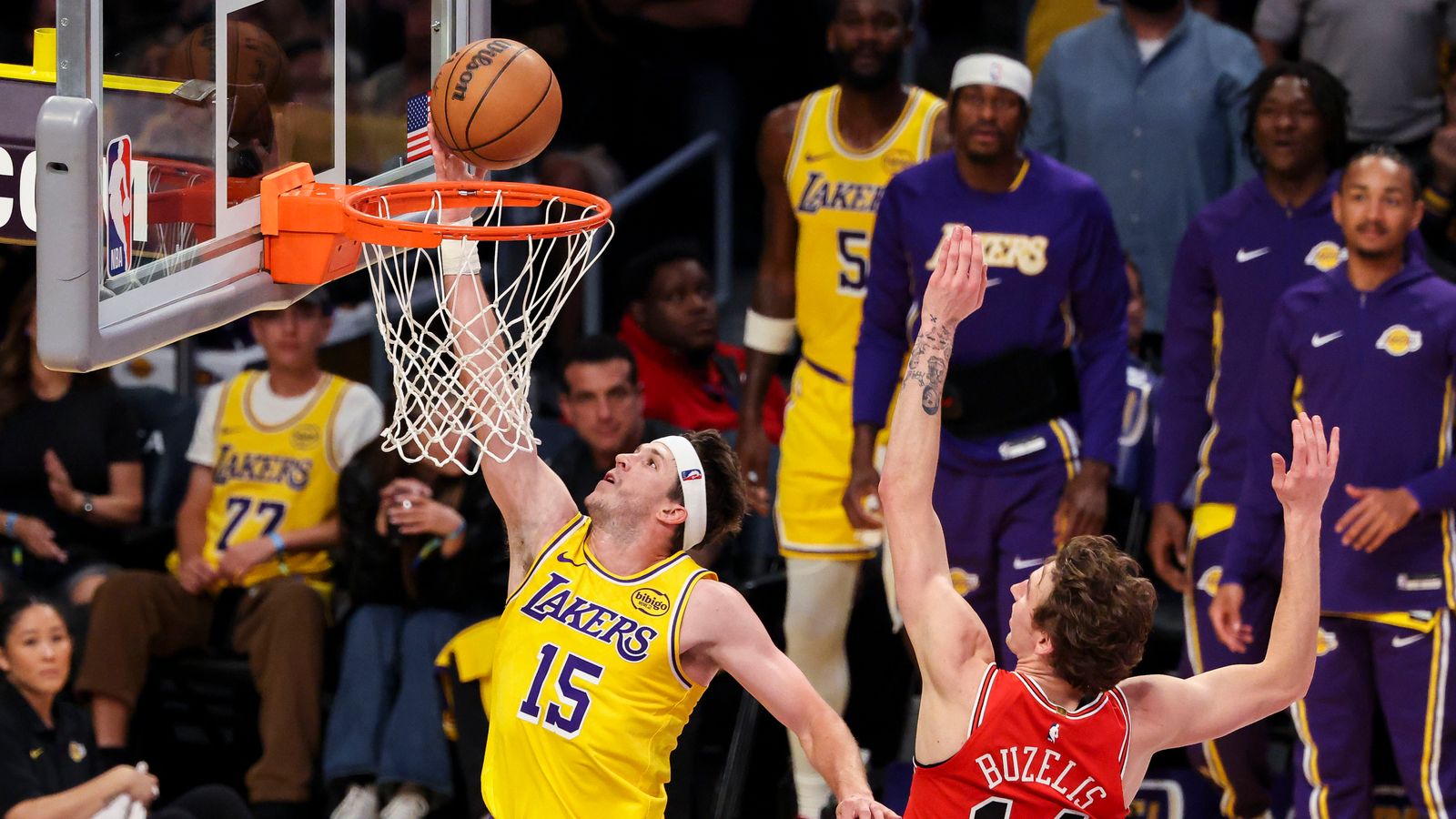 Austin Reaves #15 of the Los Angeles Lakers lays the ball up during an NBA basketball game against the Chicago Bulls, Thursday March 12, 2026 in Los Angeles, Calif.