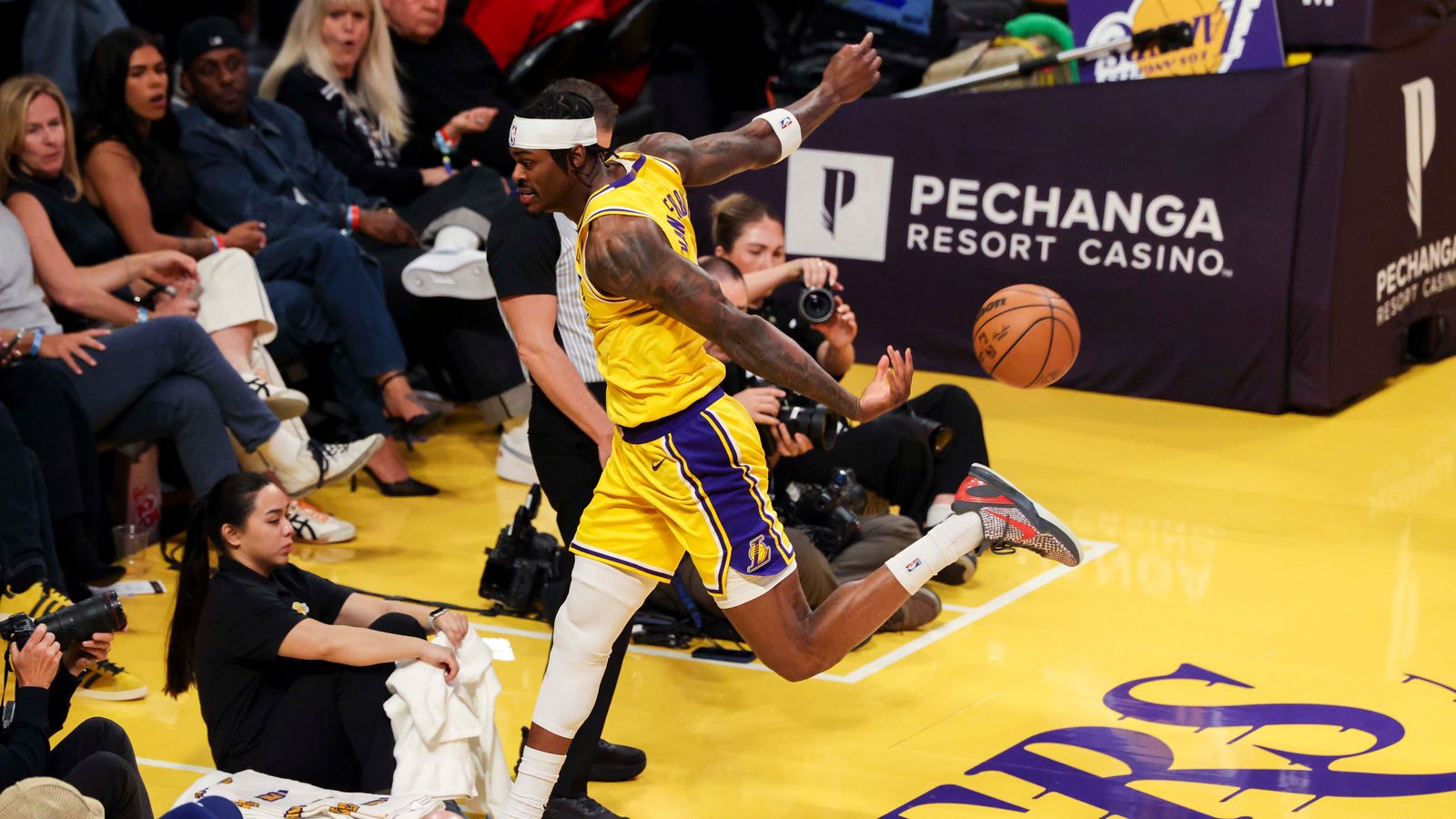 Jarred Vanderbilt #2 of the Los Angeles Lakers saves the ball from going out of bounds during an NBA basketball game against the Chicago Bulls, Thursday March 12, 2026 in Los Angeles, Calif.