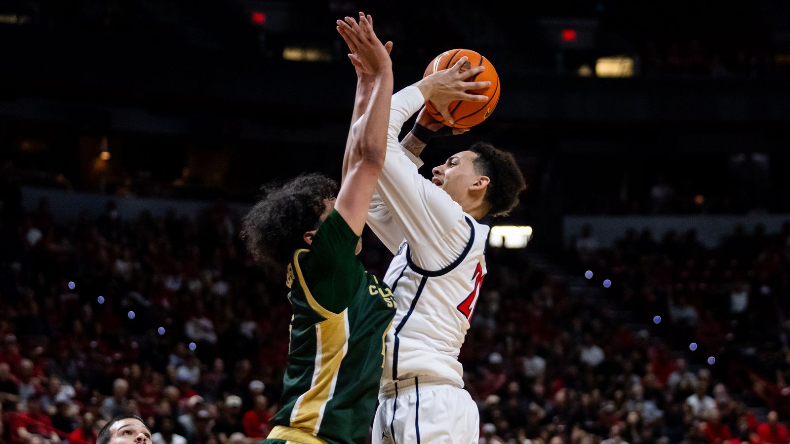 San Diego Aztecs guard Miles Byrd (21) goes for a contested lay-up during a Mountain West Championship tournament quarterfinal game between the San Diego Aztecs and the Colorado State Rams, Thursday March 12, 2026 in Las Vegas, Nev.
