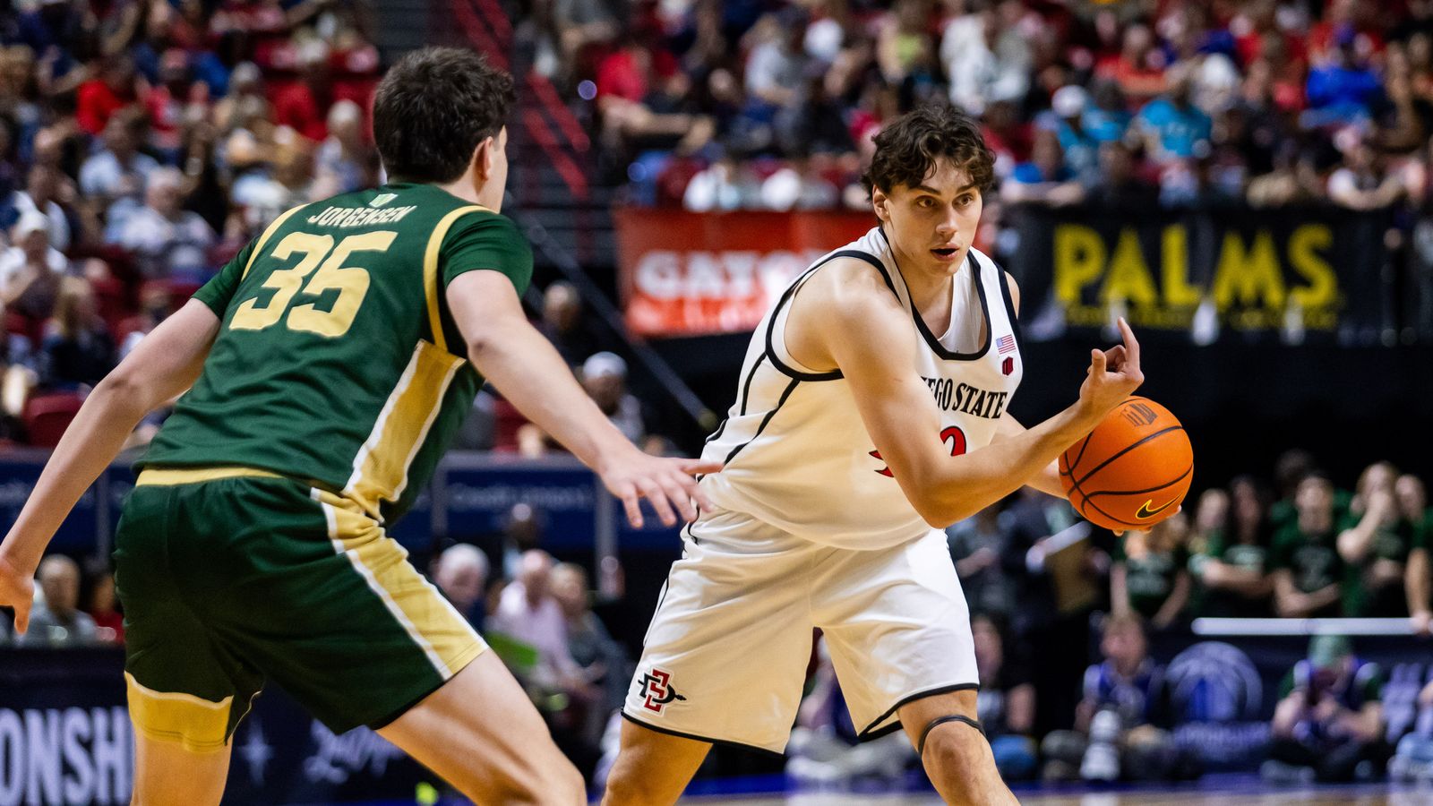 San Diego Aztecs forward Miles Heide (40) looks to pass the ball during a Mountain West Championship tournament quarterfinal game between the San Diego Aztecs and the Colorado State Rams, Thursday March 12, 2026 in Las Vegas, Nev.
