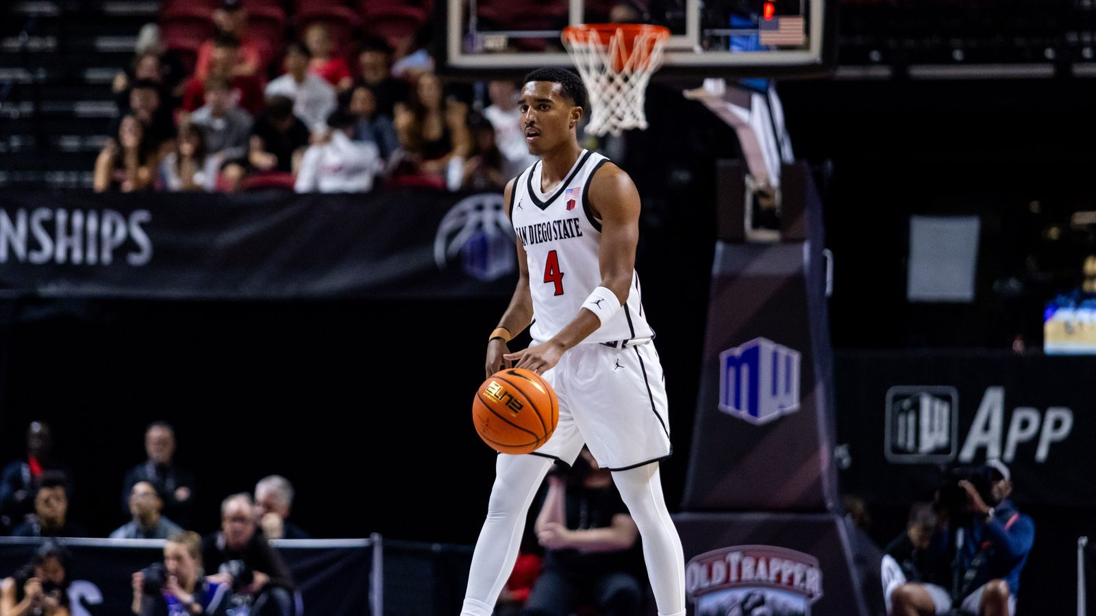 San Diego Aztecs guard Sean Newman Jr. (4) dribbles the ball up the court during a Mountain West Championship tournament quarterfinal game between the San Diego Aztecs and the Colorado State Rams, Thursday March 12, 2026 in Las Vegas, Nev.