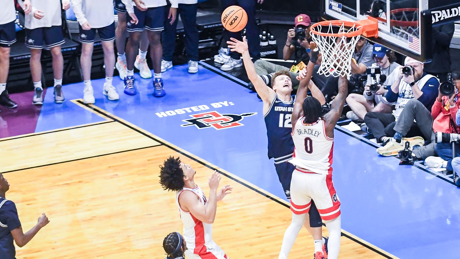 Utah State guard Mason Falslev (12) shoots the ball  during an NCAA East Region second round game against  Arizona Sunday March 22, 2026 in  San Diego, California.