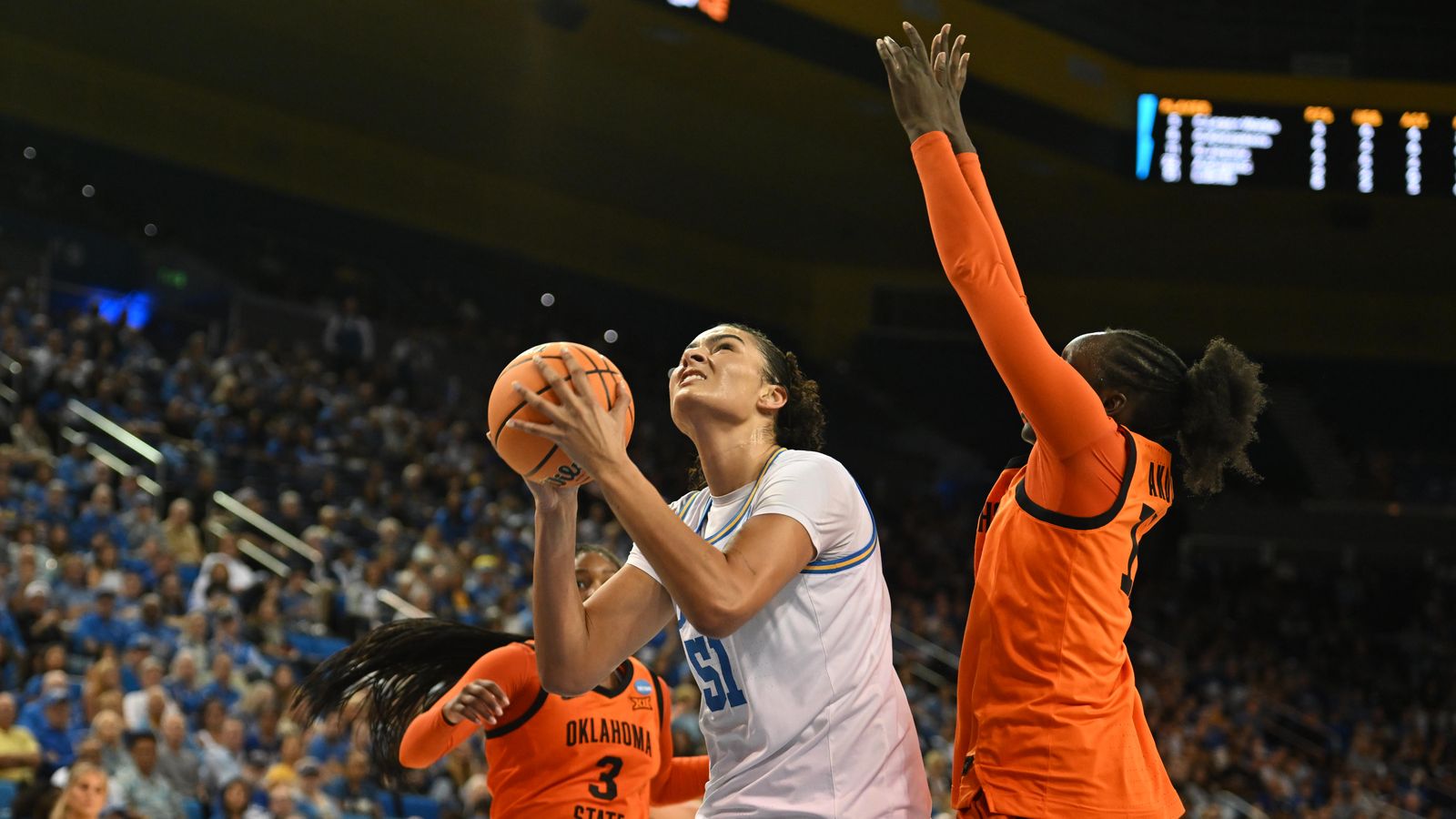 UCLA center Lauren Betts #51 makes a move in the paint during an NCAA Women's Basketball game between Oklahoma State University and University of California Los Angeles on Monday, March 23, 2026 at Pauley Pavilion in Los Angeles Calif