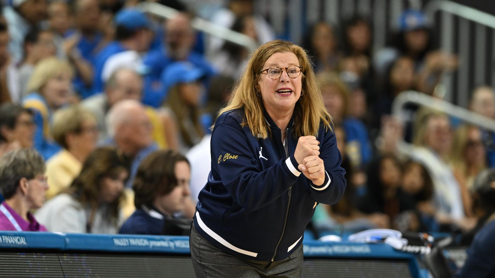 UCLA head coach Cori Close communicates with her players during an NCAA Women's Basketball game between Oklahoma State University and University of California Los Angeles on Monday, March 23, 2026 at Pauley Pavilion in Los Angeles Calif