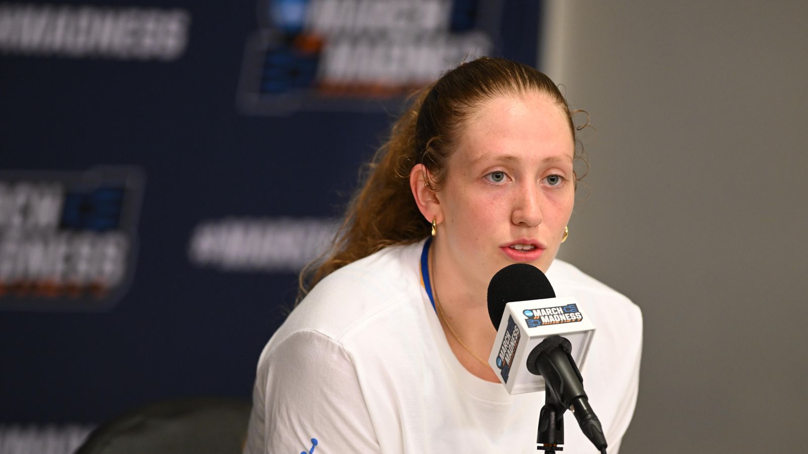 UCLA guard Gianna Kneepkens #8 speaks to the media after an NCAA Women's Basketball game between Oklahoma State University and University of California Los Angeles on Monday, March 23, 2026 at Pauley Pavilion in Los Angeles Calif