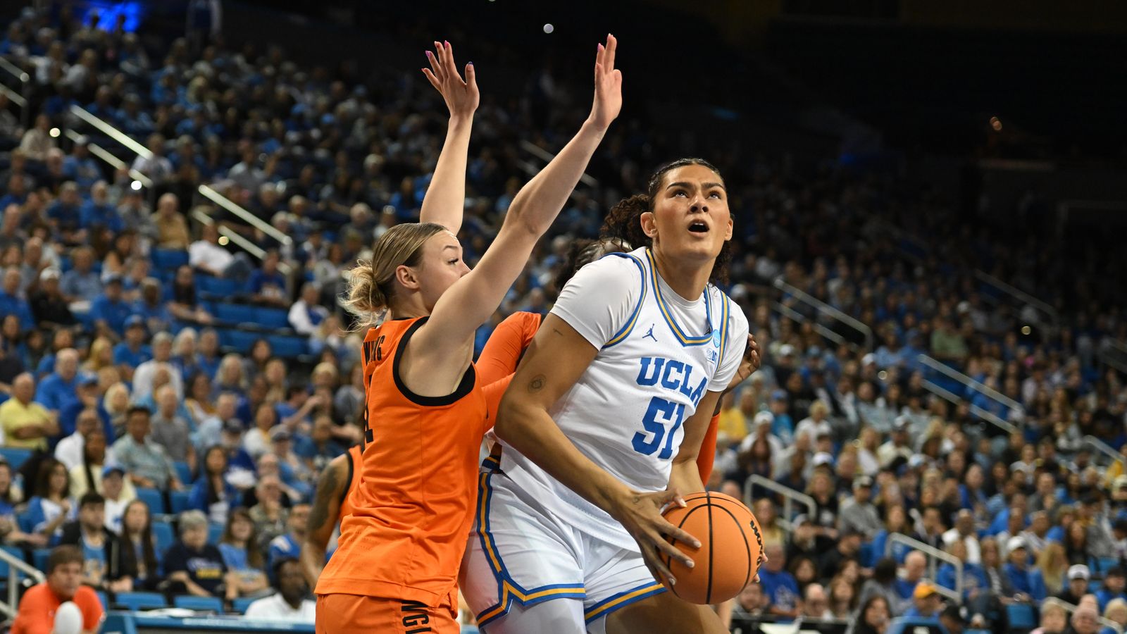 UCLA center Lauren Betts #51 makes a move in the paint during an NCAA Women's Basketball game between Oklahoma State University and University of California Los Angeles on Monday, March 23, 2026 at Pauley Pavilion in Los Angeles Calif