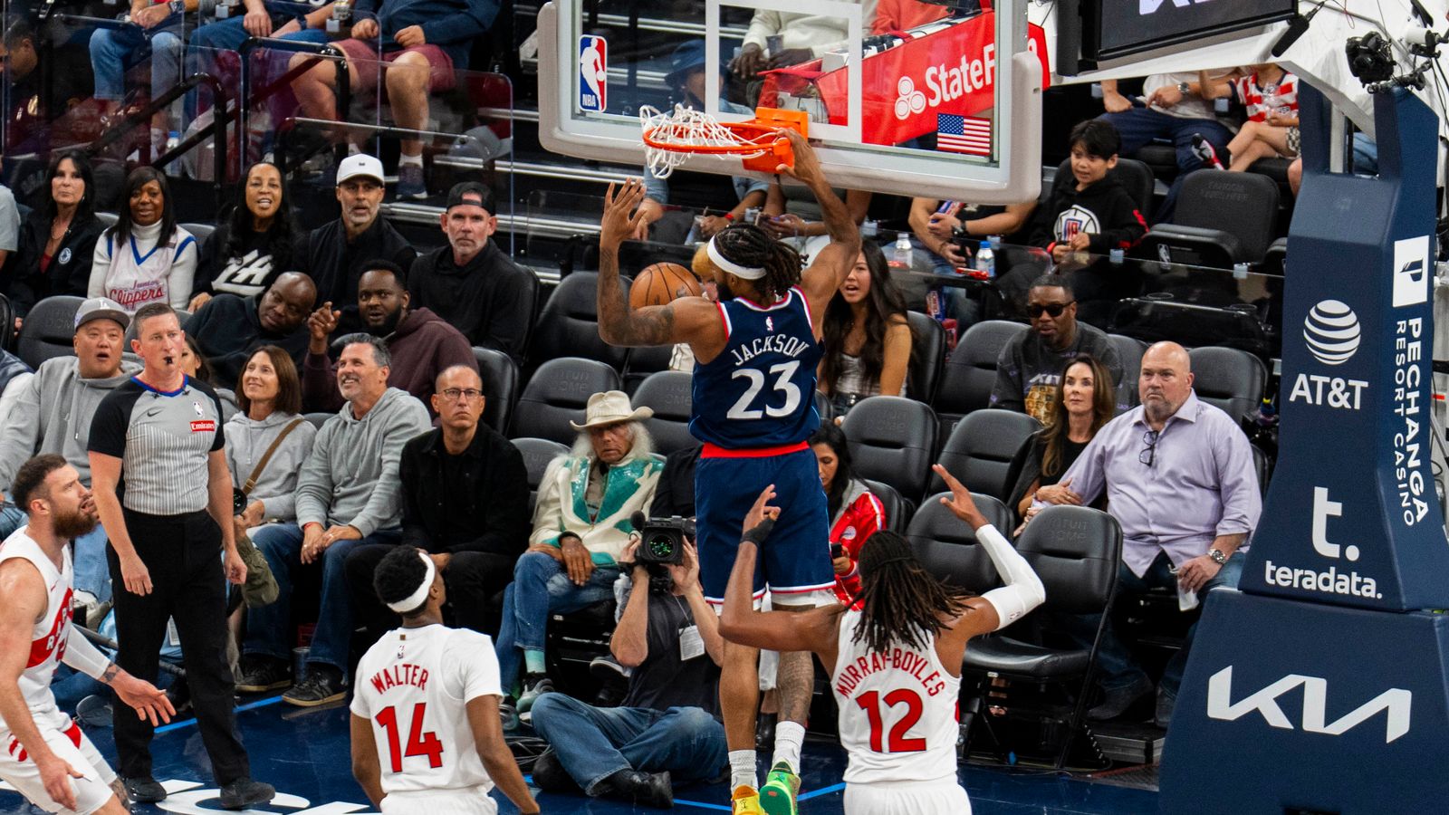 Isaiah Jackson rattles the rim with a transition dunk