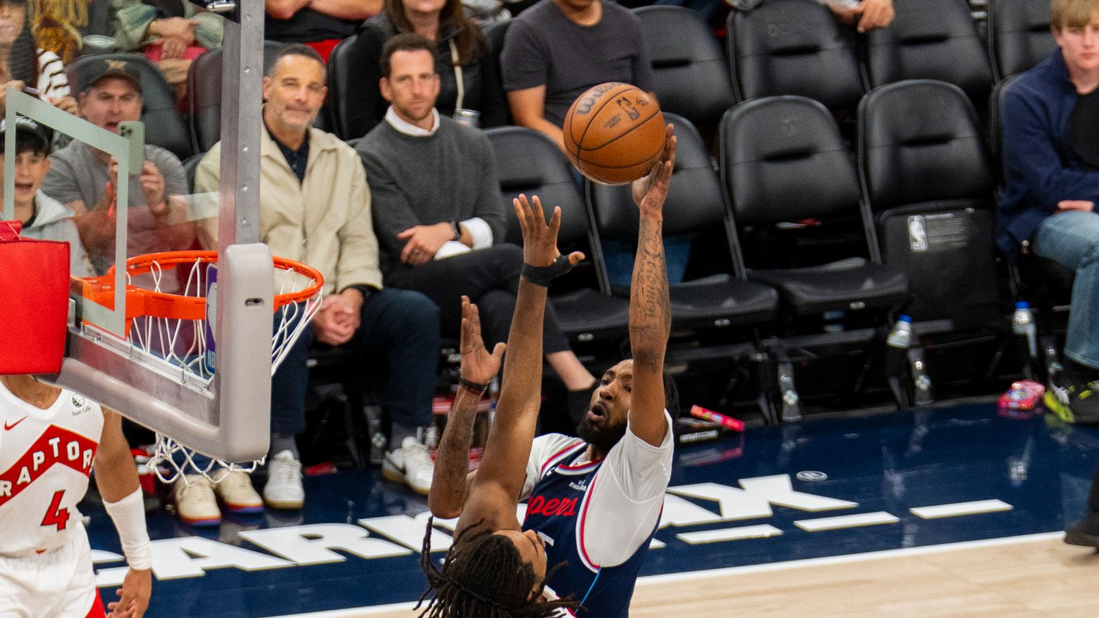 Derrick Jones Jr.'s floater goes up over the visiting defense