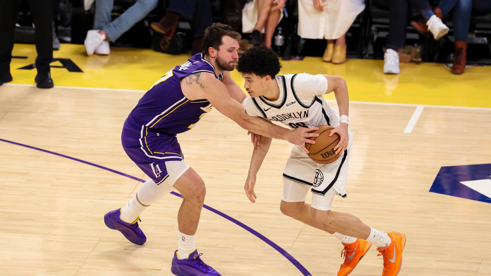 Luka Doncic defends