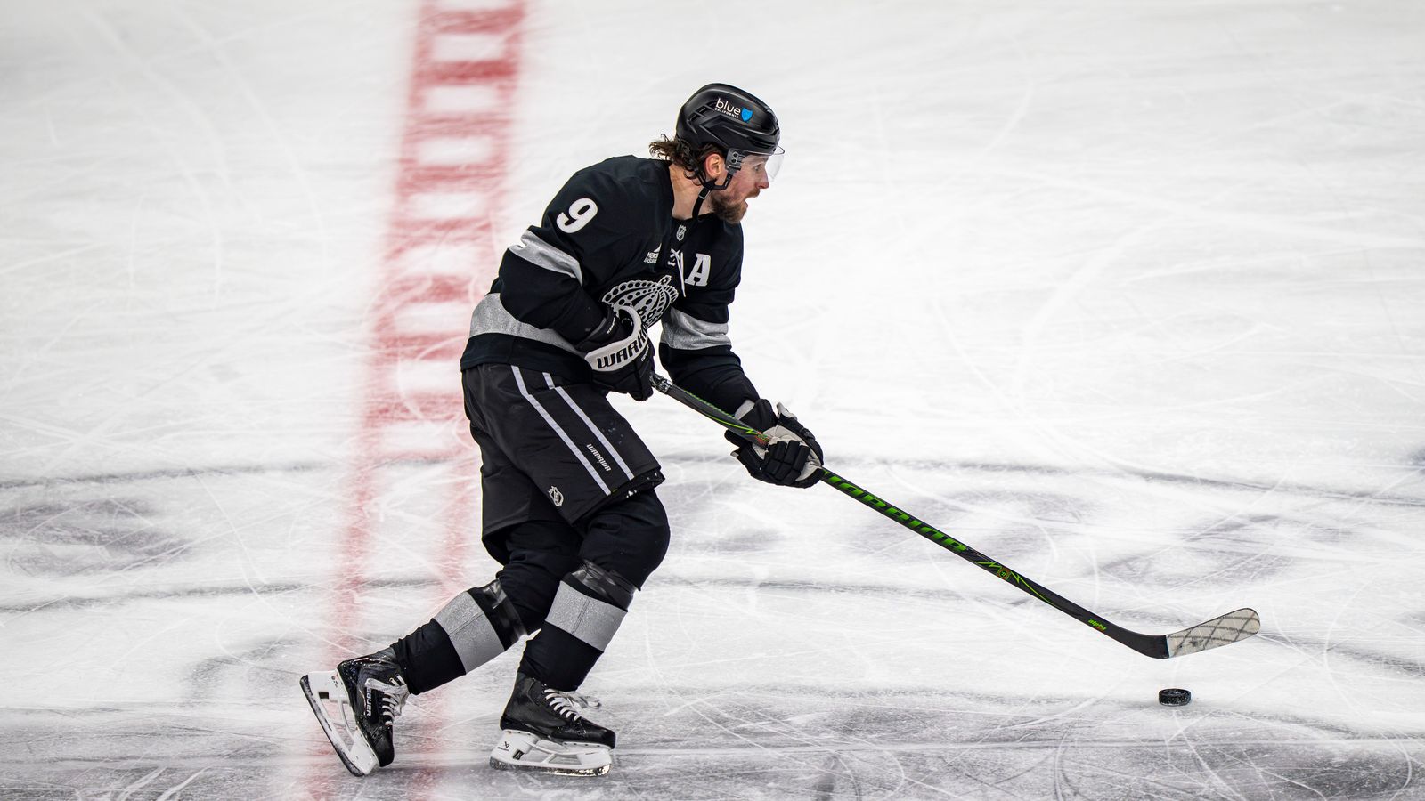 Kings Adrian Kempe (9) skating with the puck