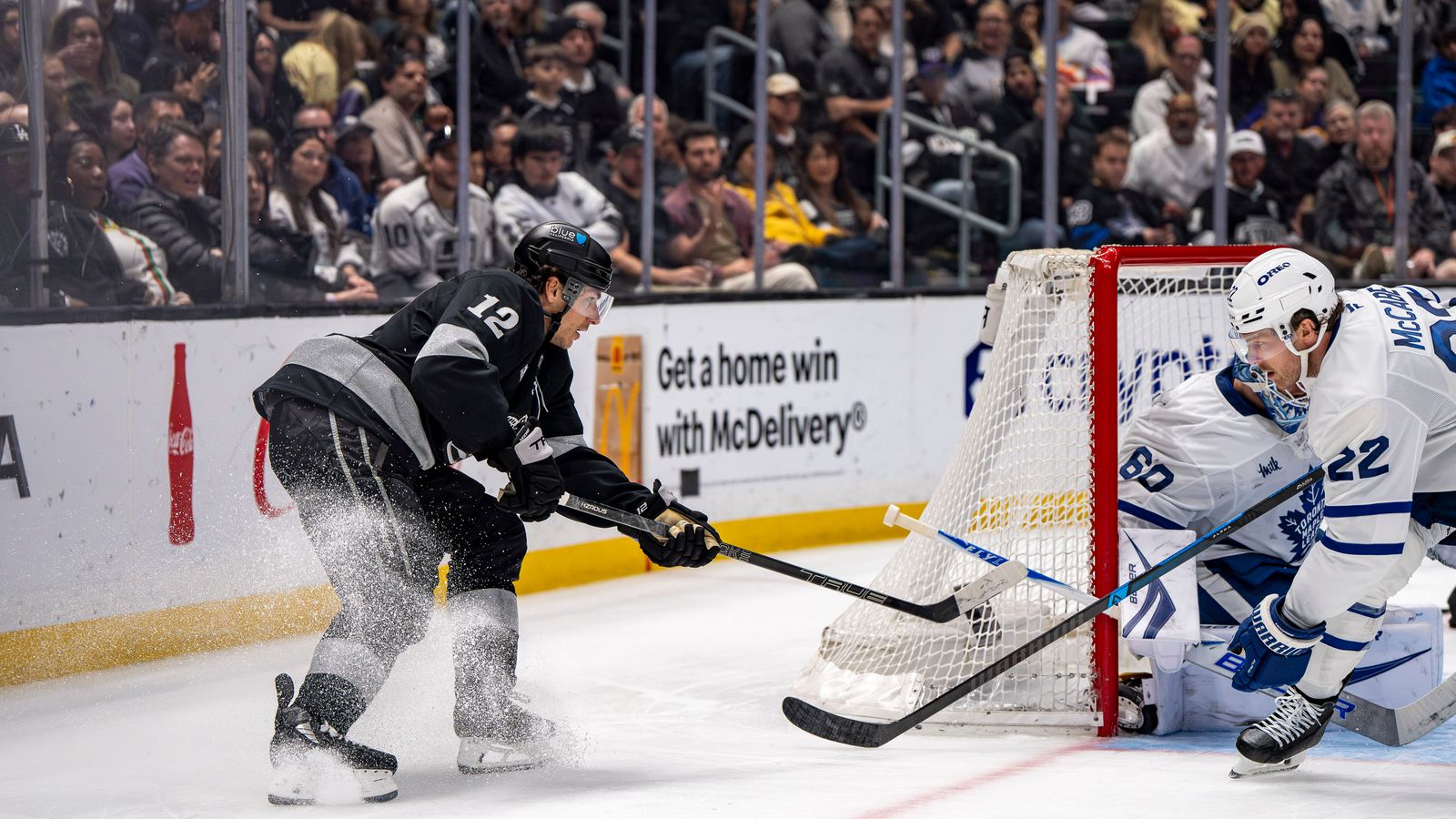 Kings Trevor Moore (12) attempting a goal