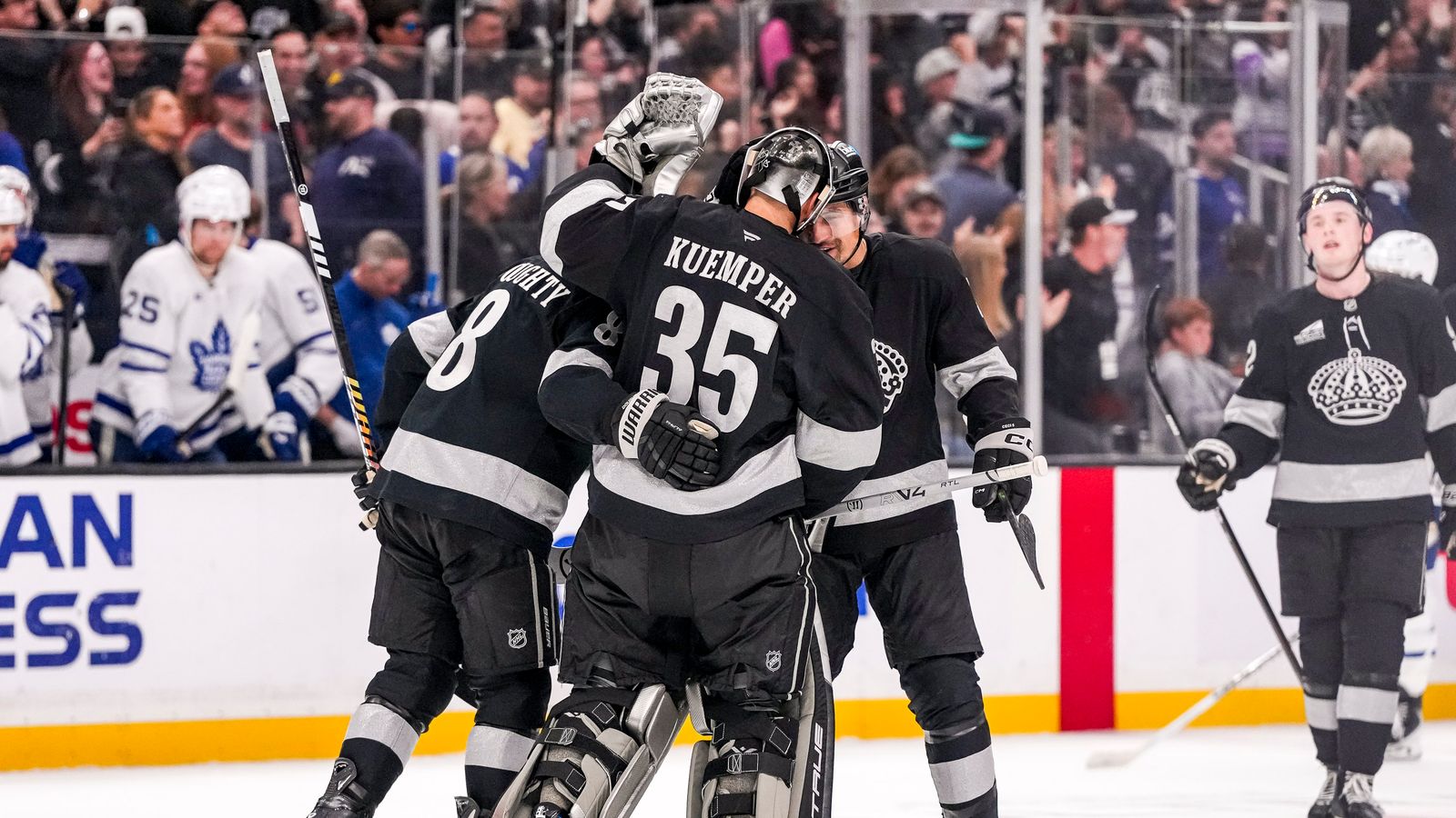 Kings players celebrating winning